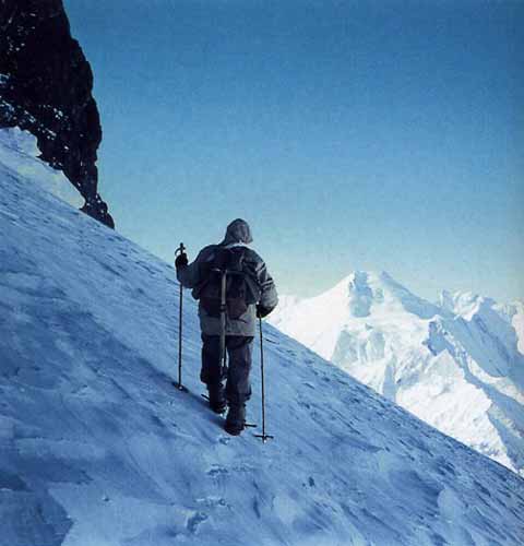 
Hermann Buhl during the first ascent of Broad Peak in 1957 with Chogolisa in the background - Hermann Buhl Climbing Without Compromise book
